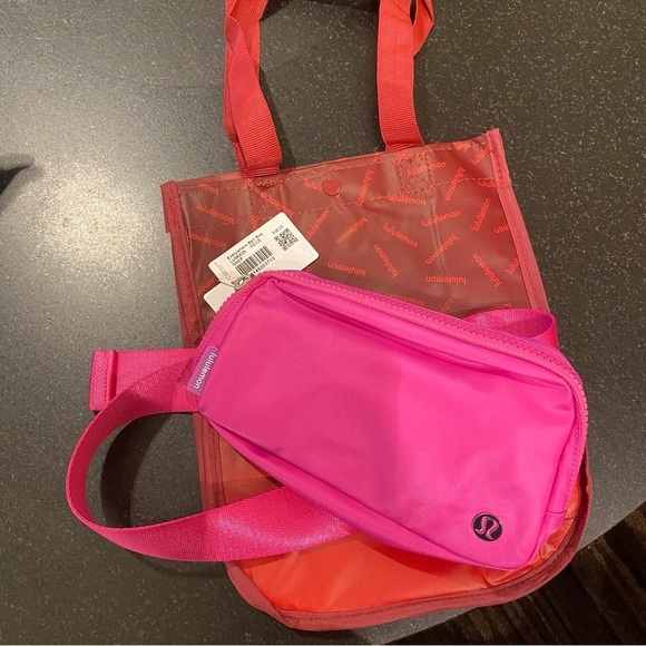 lululemon athletica Handbags - Lululemon Belt Bag in sonic pink NWT